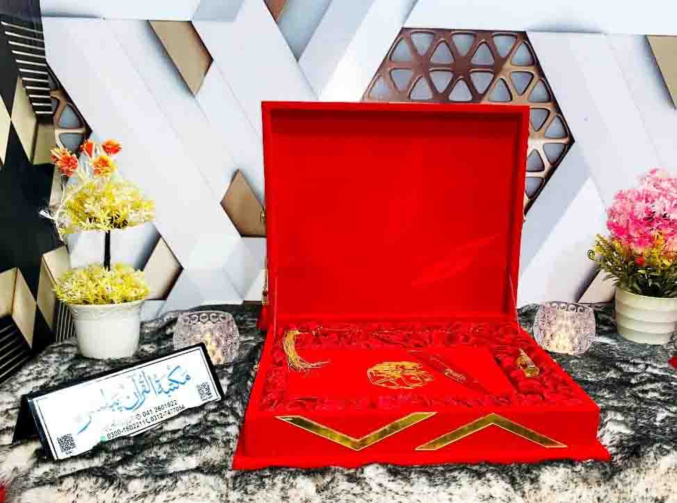 Red bridal Quran set with tasbeeh, bookmark, and attar